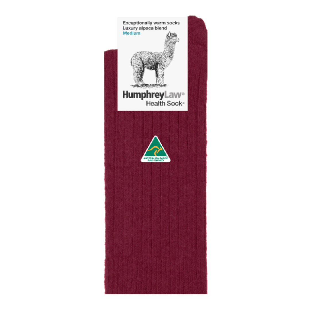 Stewarts Menswear Humphrey Law Australian Made Socks Alpaca/Wool blend. The queen of the Humphrey Law Australian Made sock range, the 60% Alpaca Health sock is an exceptionally warm luxury sock made with a blend of alpaca and wool. These socks feature the patented Health Sock® design with no tight elastic top ensuring a comfortable fit without constricting your circulation. Not suitable for work boots. Colour is Berry