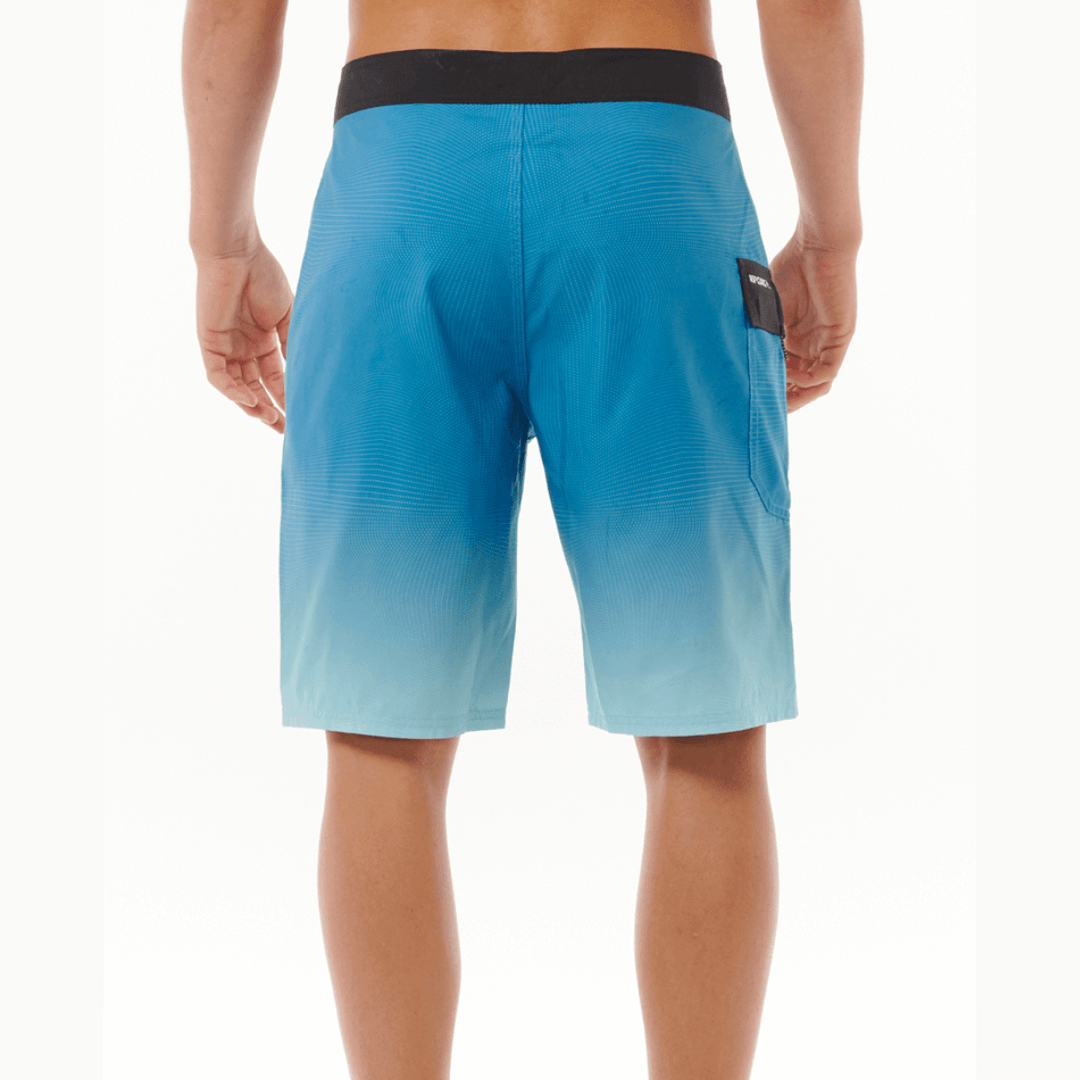 Stewarts Menswear Rip Curl Shock Boardshort. Photo shows back view of model wearing Rip Curl Shock Boardshorts. Colour is Blue.