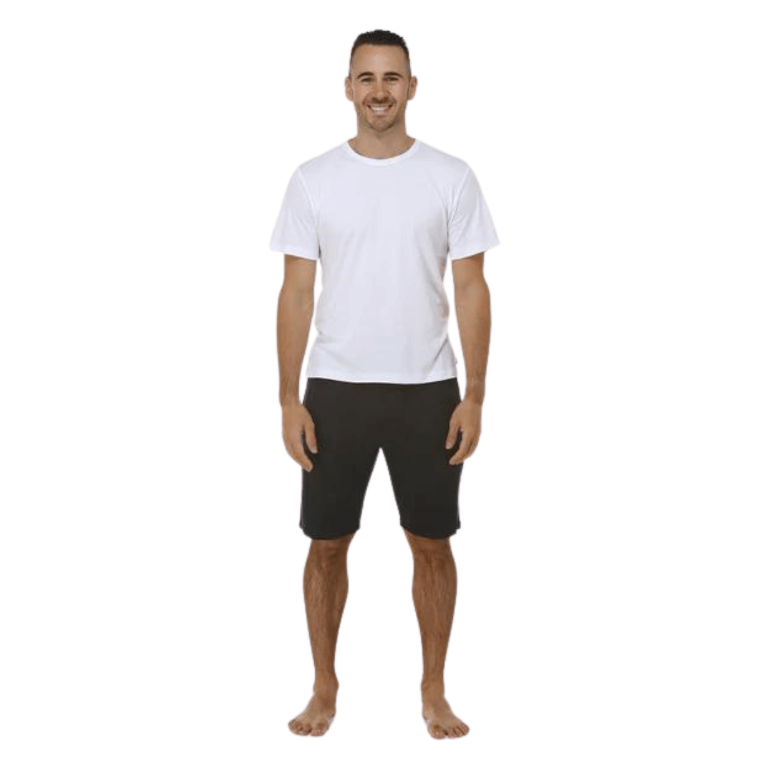 Stewarts Menswear Bamboozled bamboo jersey sleep shorts. Made from a sustainable Bamboo blend, they are luxuriously soft and breathable and will have you feeling relaxed in no time at all. Elasticised waist with front tie. Photo shows model wearing black sleep shorts with white t-shirt.
