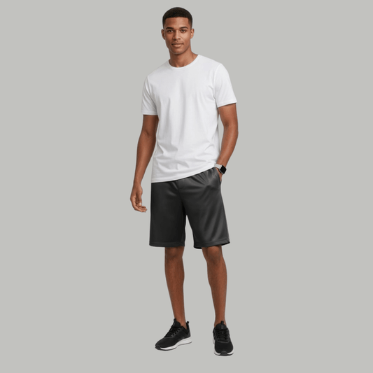 Model wearing men's Biz Cool sport shorts available from Stewart's Menswear Mullumbimby