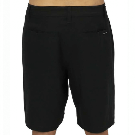 Back view of Carve Pelagic Walk Short in black, men's quick dry stretch hybrid shorts with side pockets and Carve logo badge on the leg, available at Stewart's Menswear Mullumbimby.