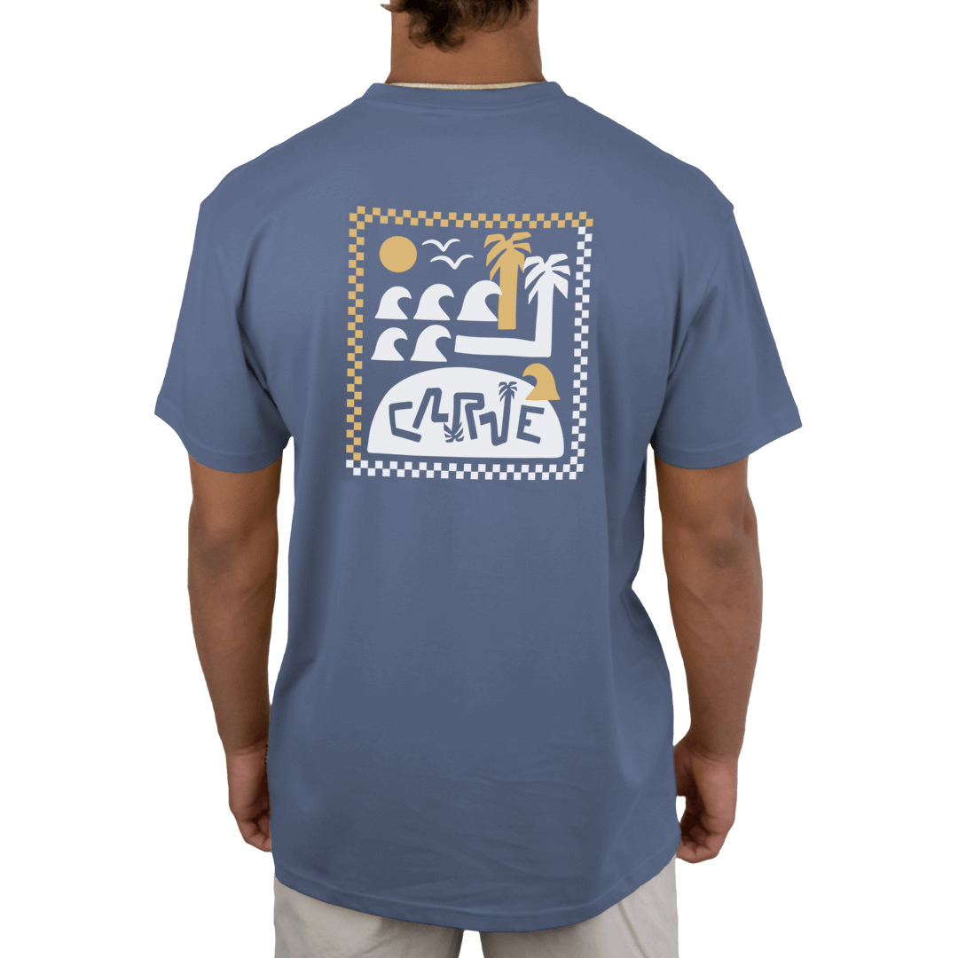 Stewarts Menswear Carve Surf n Sun Tee. This is a regular fit men's short sleeve T-shirt with small chest print and large back graphic print. With sizes from S to 5XL, no-one is excluded from having up to date seasonal fashion. Graphic is an abstract image of waves, sun and pandanus palms in white and yellow on blue background