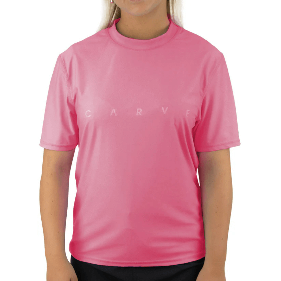 Stewarts Menswear Carve Wipe Out girls rashie. Colour is pink with small same colour Carve print across chest.