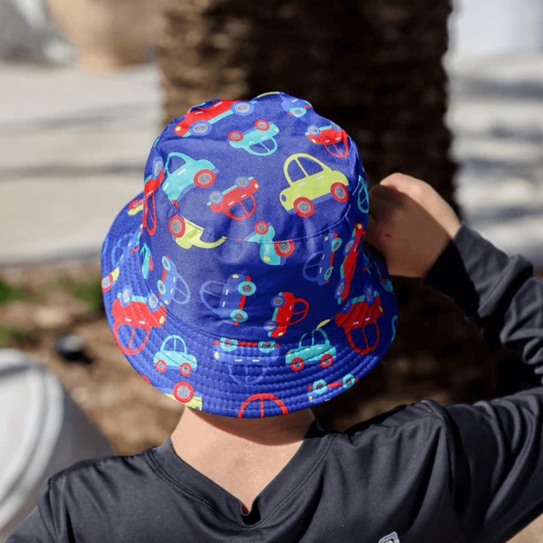 Stewarts Menswear Free Spirit Australia Kids Bucket Hat. Blue hat featuring a fun bright coloured car print all over.
