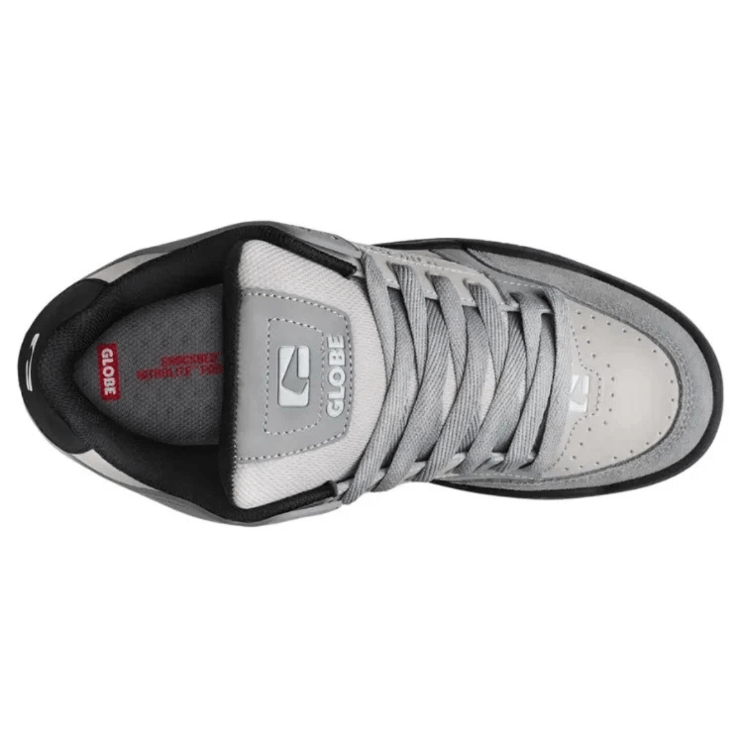 Globe Tilt skate shoe available from Stewart's Menswear, Mullumbimby. Top view of Globe Tilt Silver/grey coloured shoe with black trim.