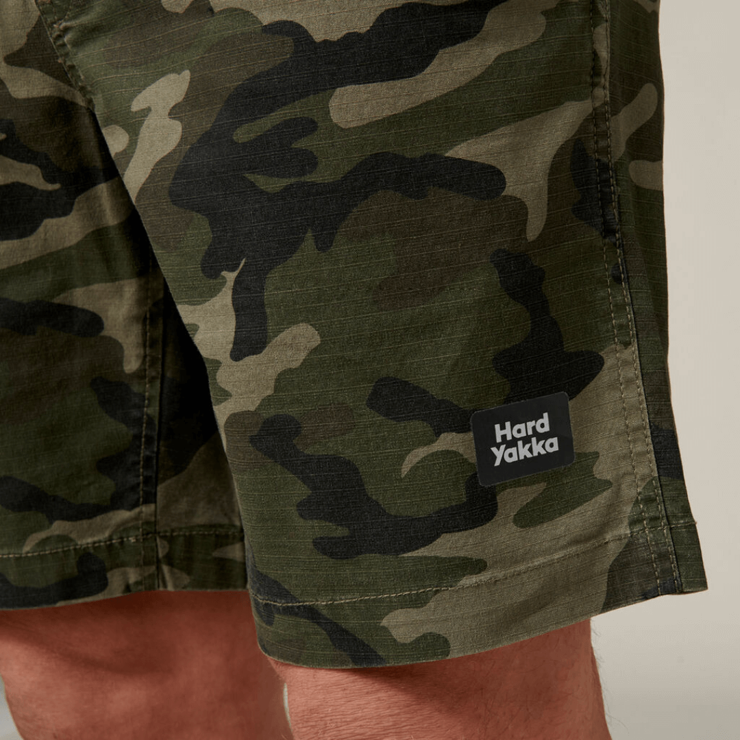 These stylish active Camo shorts are the perfect addition to your wardrobe. With an elastic waist and made from cotton rich stretch ripstop fabric, they are both comfortable and durable. Featuring a stylish on trend camo print, slim fit with plenty of pockets. Photo is close up of the stretch rip stop fabric.