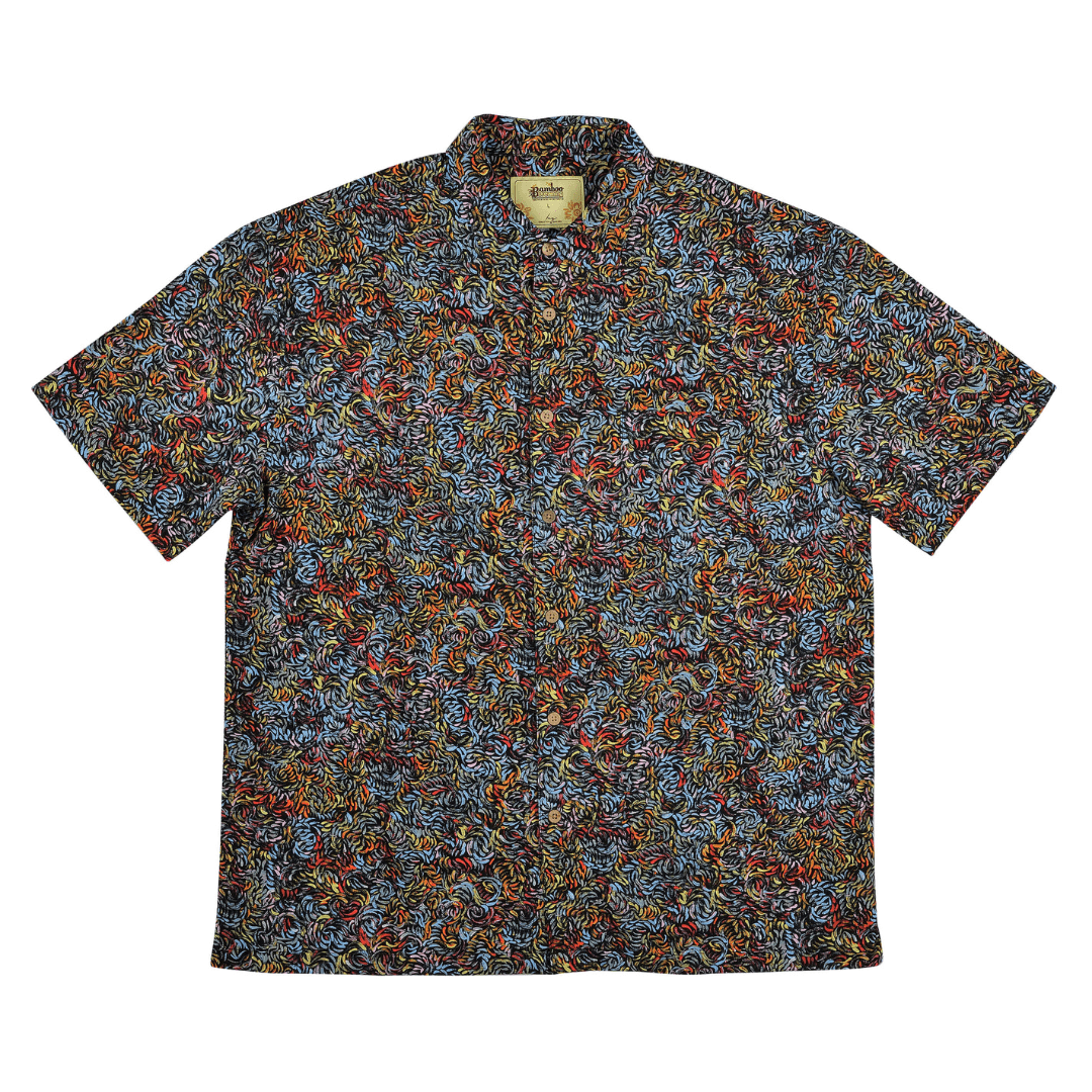 Stewart's Menswear Kingston Grange Bamboo Dreaming men's short sleeve shirt. Bamboo clothing is perfect to wear in our climate and it’s better for the planet too! Bamboo clothing feels soft and silky, a very luxurious fabric which is comfortable to wear. It’s anti static so it sits on the body nicely without clinging. It is also hypoallergenic, breathable and absorbent. This men's bamboo shirt named Skinny Bush Banana features an aboriginal print on black background with many bright colours.
