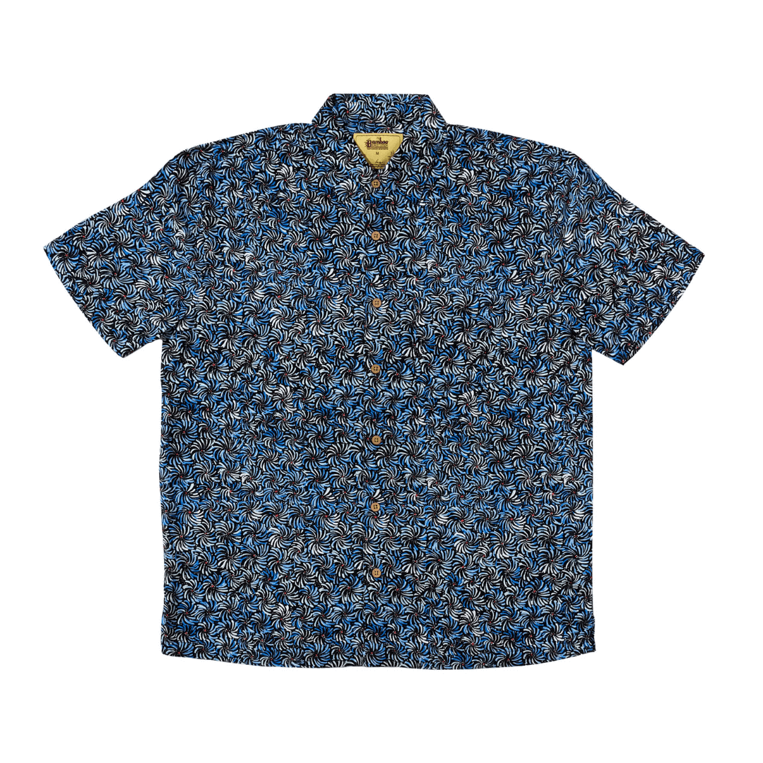 Stewart's Menswear Kingston Grange Bamboo Dreaming men's short sleeve shirt. Bamboo clothing is perfect to wear in our climate and it’s better for the planet too! Bamboo clothing feels soft and silky, a very luxurious fabric which is comfortable to wear. It’s anti static so it sits on the body nicely without clinging. It is also hypoallergenic, breathable and absorbent. This men's bamboo shirt named Blue Banana features an all over aboriginal brush strokes print in shades of blue and white.