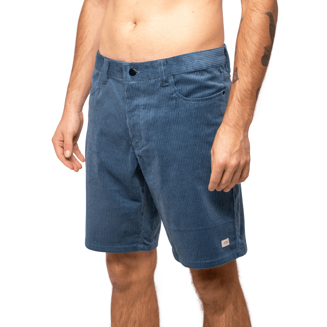 Stewarts Menswear Liive Apparel Falcon corduroy walkshort. Perfect for casual days, these shorts pair seamlessly with your favourite t-shirts, polos, or button-downs. Wear them with sneakers for a relaxed look or dress them up with loafers for a smart-casual occasion. Colour is called Navy, but it is lighter, more like a stone blue colour. Front view.