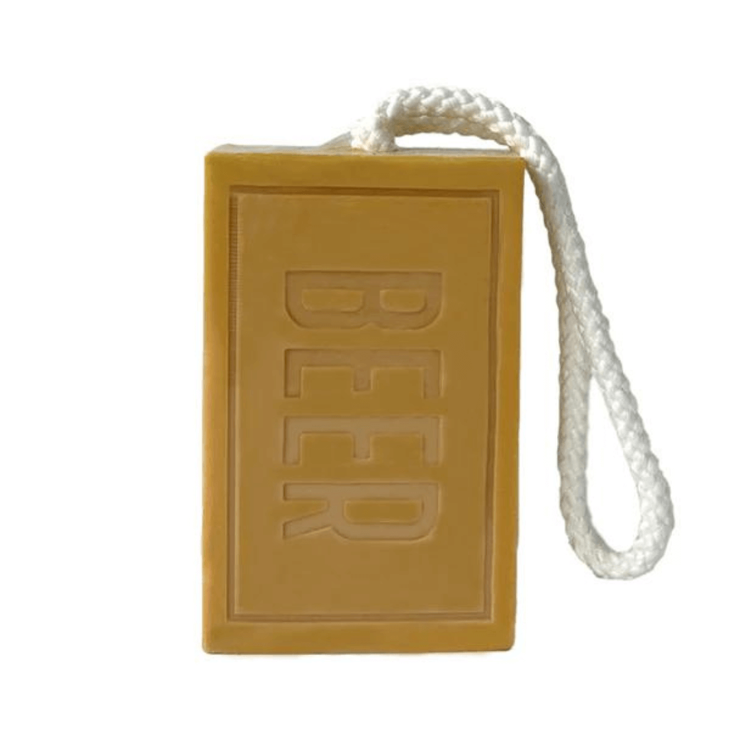 Stewarts-menswear-men's republic gifts for men. Men's republic booze soap on a rope. Each bar is infused with Malted Barley or Hops which adds a unique touch. An image Beer Soap on a rope. Colour is amber, with the word BEER.