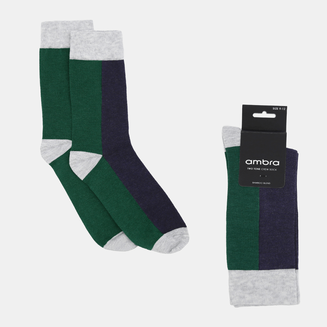 Stewarts Menswear, Mullumbimby. Ambra Bamboo two tone crew socks. Photo shows flat lay of Ambra bamboo two tone crew socks. Split colour, back of sock is bottle green, front of sock is navy blue with light grey toe, heel and top trim.