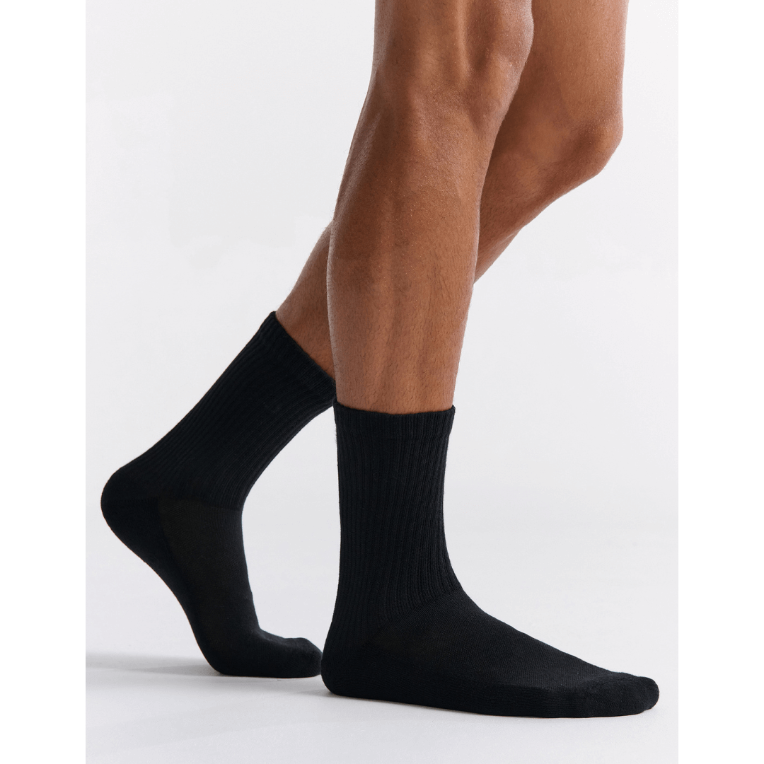 Stewarts Menswear Mullumbimby. Ambra men's active high ankle socks. Photo shows model wearing Ambra men's active high ankle socks. Colour is Black.