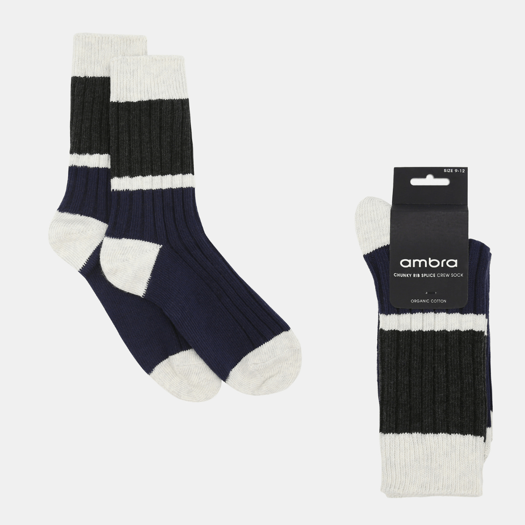 Stewarts Menswear Mullumbimby. Ambra Mens chunky rib splice crew socks. Organic Cotton socks. Spliced design with Navy Blue coloured sole, white stripe and black crew top with white trim around top. Photo shows flat lay of socks in packaging.