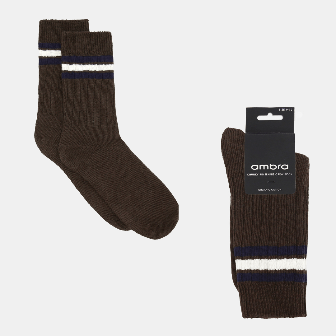 Stewarts Menswear Mullumbimby. Ambra Men's Chunky rib tennis stripe crew socks. Organic Cotton socks. Chocolate Brown colour with three stripes at top (2 x navy with 1 x white in between). Photo shows flat lay of Ambra men's chunky rib tennis crew socks in Cappucino.