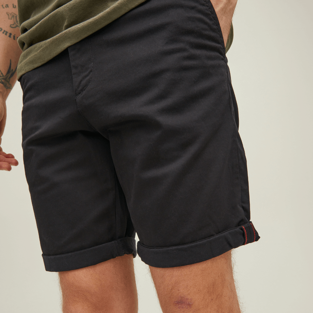 Stewart's Menswear, Mullumbimby. Jack & Jones Bowie Chino Shorts. Photo shows close up of model wearing Jack & Jones Chino Shorts. Colour is Black.