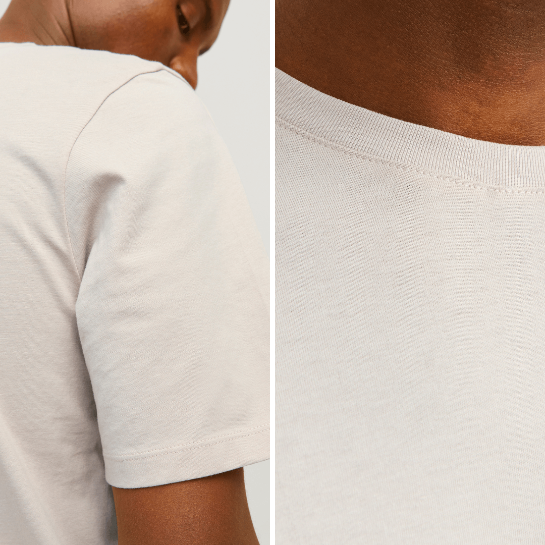 Stewart's Menswear, Mullumbimby. Jack & Jones Organic Cotton T-Shirt. Photo shows model wearing Jack & Jones Organic Cotton T-shirt in Moonbeam colour. Photo shows close up of model wearing Jack & Jones organic cotton T-shirt highlighting the colour an sleeve.