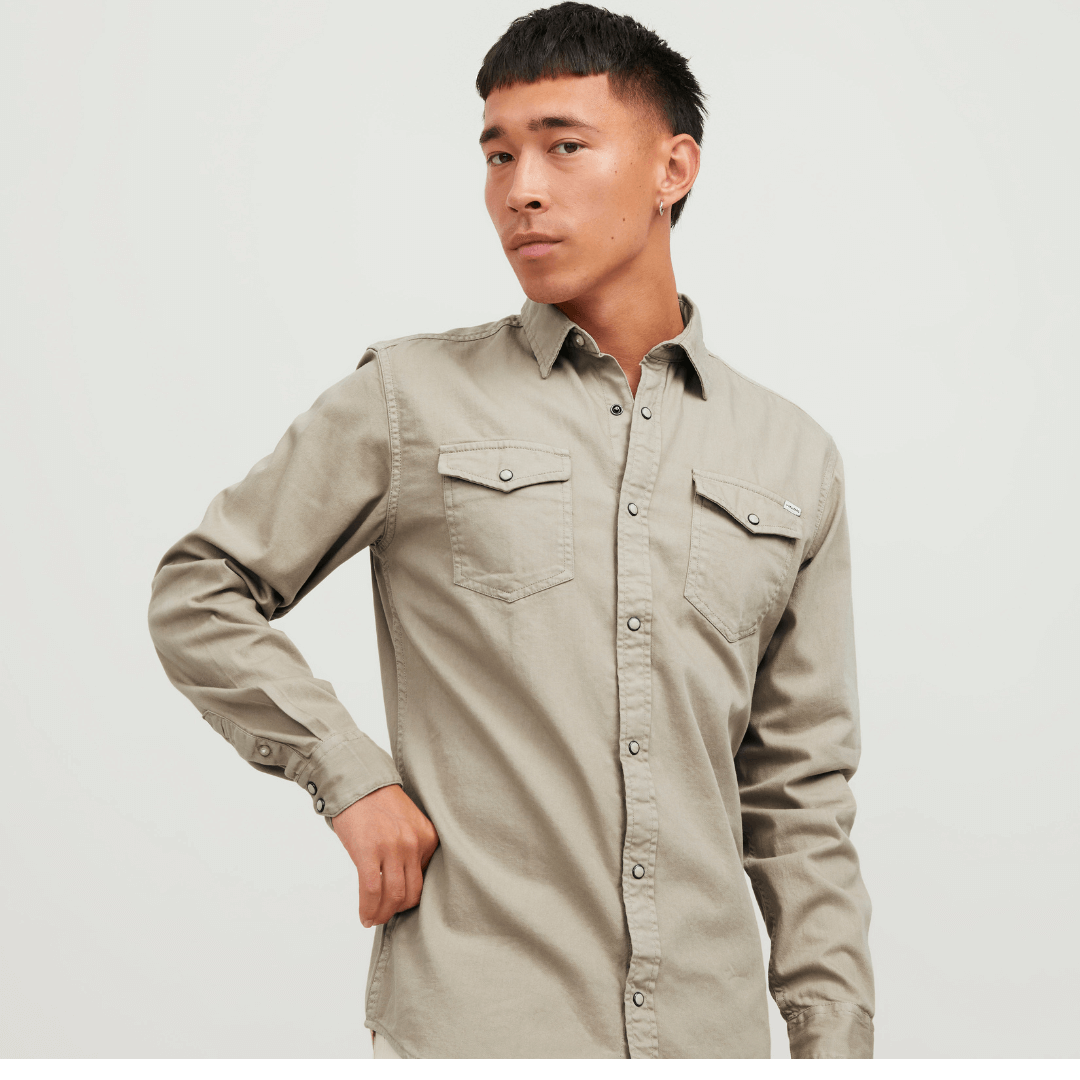 stewarts menswear, Mullumbimby. Jack & Jones SHeridan Denim shirt. Colour is crockery. Photo shows model wearing Jack & JOnes Sheridan long sleeve denim shirt in crockery colour.