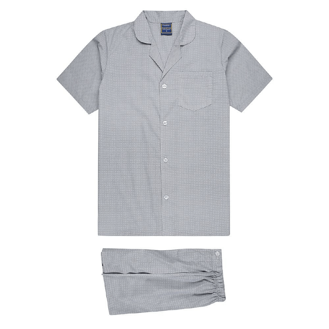 Go to sleep wearing Australia's comfiest pyjamas. Koala's Tradition pyjamas are generously made for extra comfort using a 60% cotton 40% polyester blend which make it soft yet durable for many nights of comfortable sleep. The shirt features a chest pocket and the pants have a concealed fly. – Cotton Rich Material – Extra Comfort Fit – Chest Pocket – Elastic Button Down Waist with Adjustable Self Fabric Tie – Button Down Concealed Fly – Colour is Blue Grey all over geometric print.