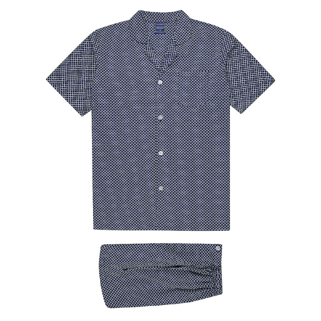 Go to sleep wearing Australia's comfiest pyjamas. Koala's Tradition pyjamas are generously made for extra comfort using a 60% cotton 40% polyester blend which make it soft yet durable for many nights of comfortable sleep. The shirt features a chest pocket and the pants have a concealed fly. – Cotton Rich Material – Extra Comfort Fit – Chest Pocket – Elastic Button Down Waist with Adjustable Self Fabric Tie – Button Down Concealed Fly – Colour is Navy with white all-over small geometric print.