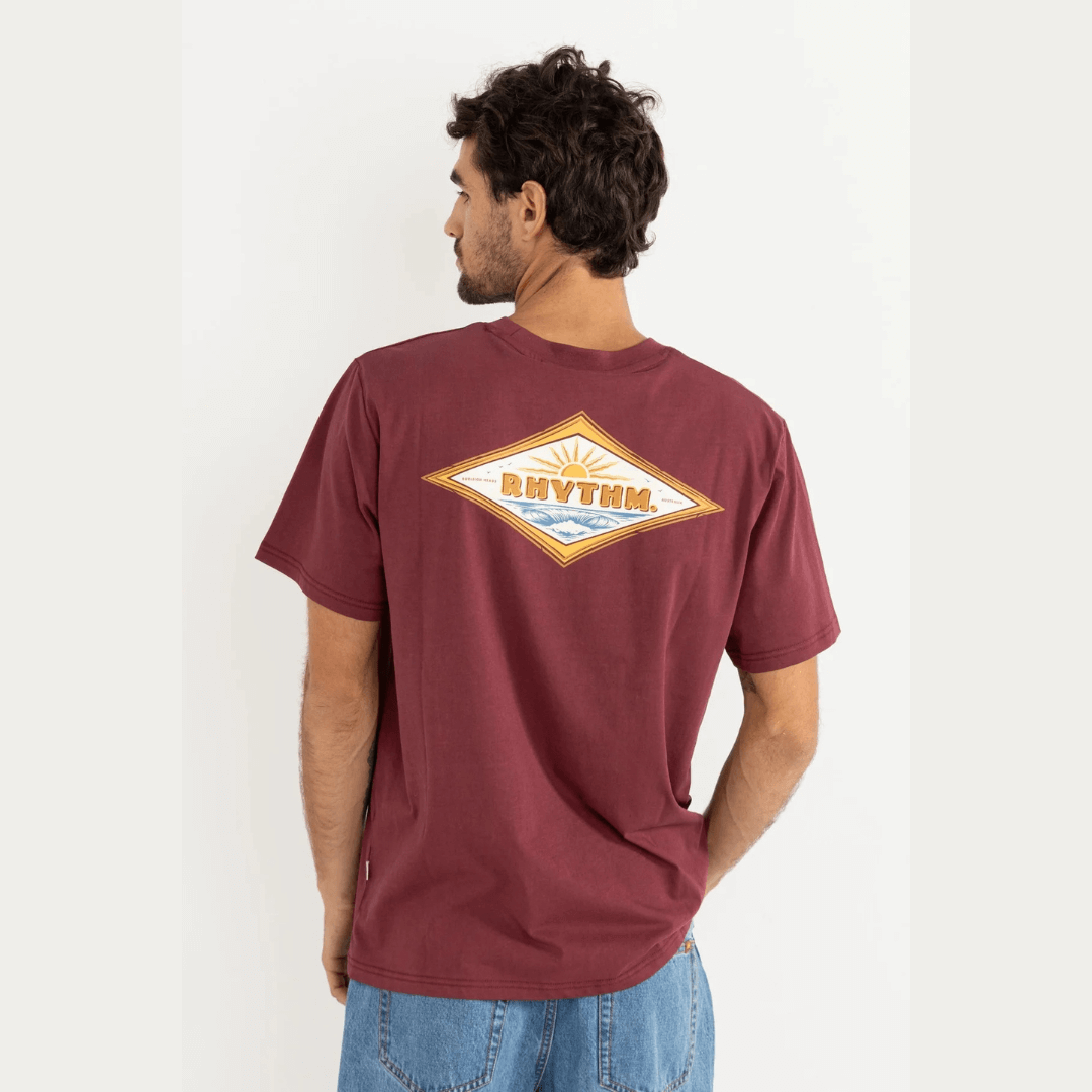 Stewarts Menswear, Mullumbimby. Rhythm Frame short sleeve t-shirt in Merlot colourway. Photo shows model wearing Rhythm Frame T-shirt with large screen print logo on back.