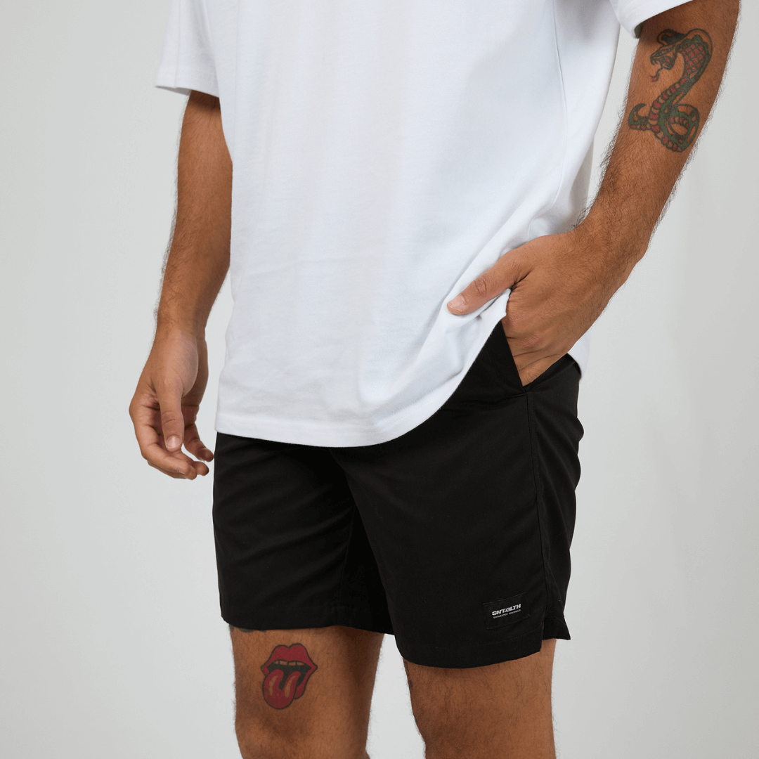 St Goliath Swim Volley Short available at Stewart’s Menswear Mullumbimby. Men’s modern fit swim short with stretch nylon, Velcro back pocket, and branded patch. PHoto shows front view, colour is Black.