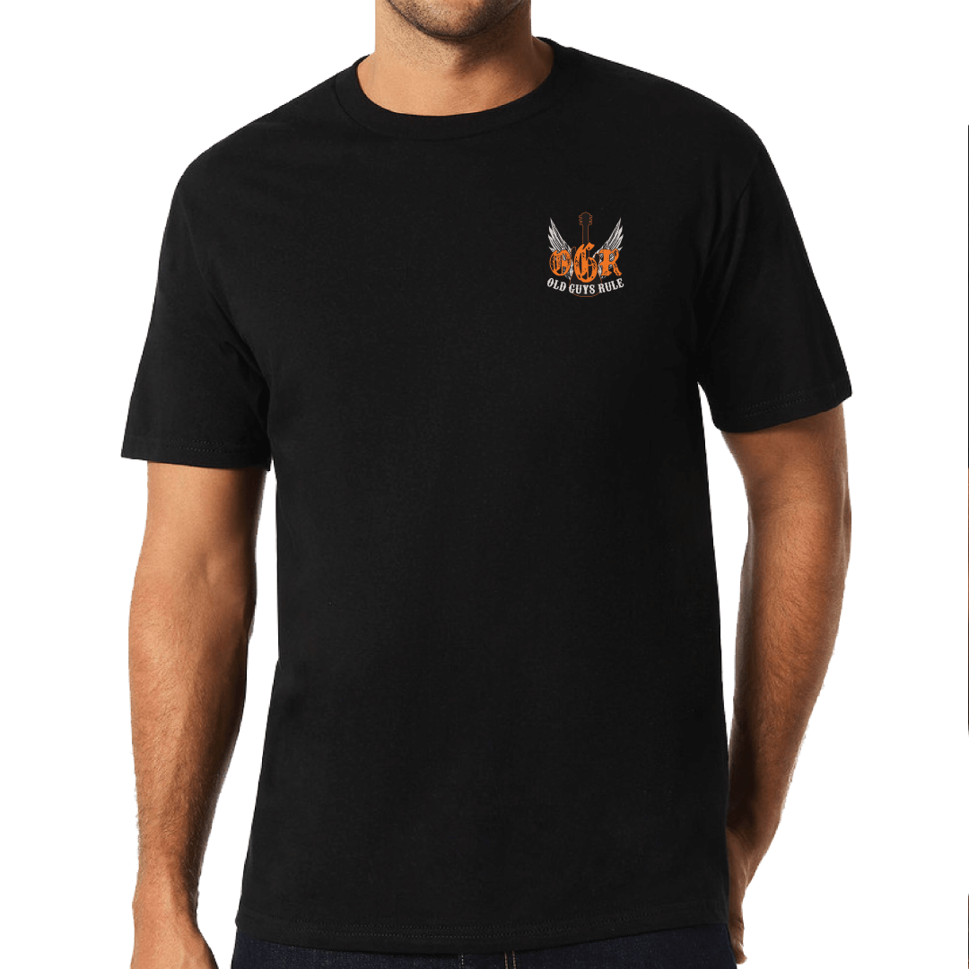 Stewarts Menswear Old Guys Rule. Old Guys Rock T-shirt. Understated and classy, the big, loud message is on the back and a smaller print version is on the front. Wear it and showcase your personality, because old guys rule! Small logo of wings and OGR on front. Back is large wings with guitar and the words "Old Guys Rock. Growing Old Disgracefully." Colour is black. Photo is of model showing front of t-shirt.