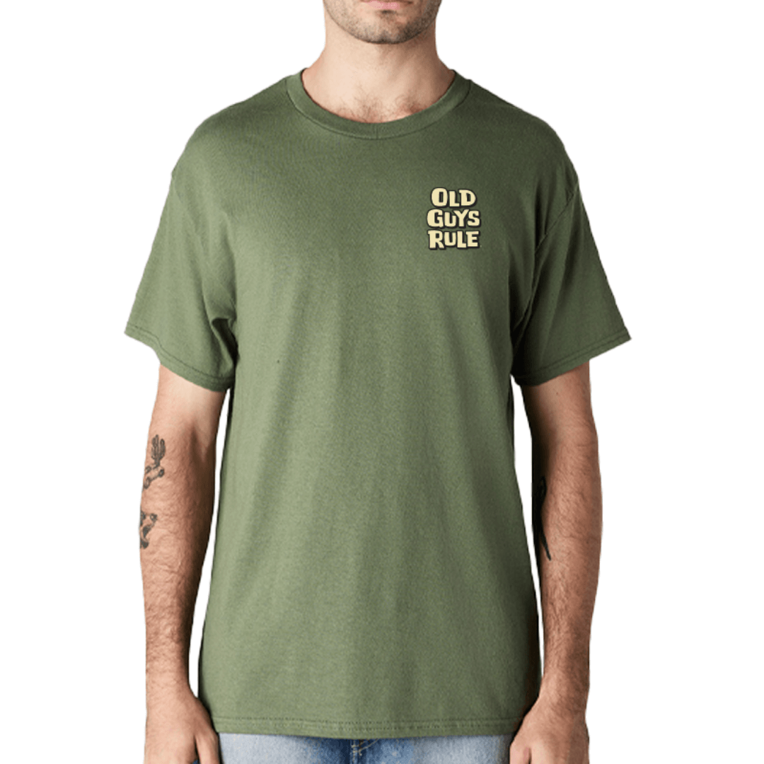 Stewart's Menswear, Mullumbimby. Old Guys Rule Surf & Turf T-shirt. Photo shows model wearing Old Guys Rule T-shirt, front view. Colour is military green with small chest print "Old Guys Rule"