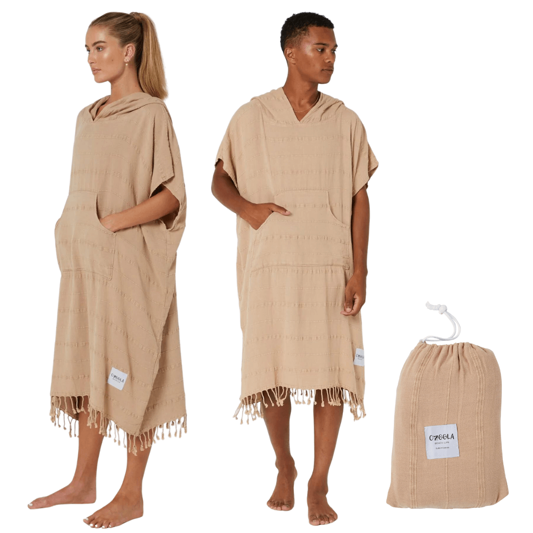 Stewarts Menswear Ozoola Surf Poncho. These surf ponchos are made from 100% Turkish Cotton which is super soft and remarkably quick drying. One size fits all surf ponchos are both stylish and practical. They come with their own bag, which you can use to carry your poncho to the beach and keep your gear in one place while you're surfing. Colour is Sand.