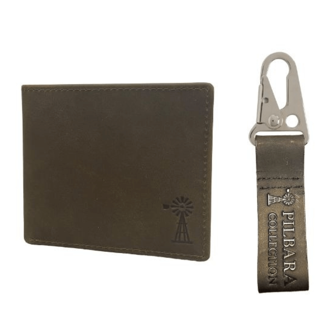 Stewart's Menswear, Mullumbimby. Pilbara collection Men's leather wallet and keyring Gift Set. Brown wallet with flip card compartment, zip coin section and embossed Pilbara Collection logo. Comes with matching Keyring and presented in gift box.