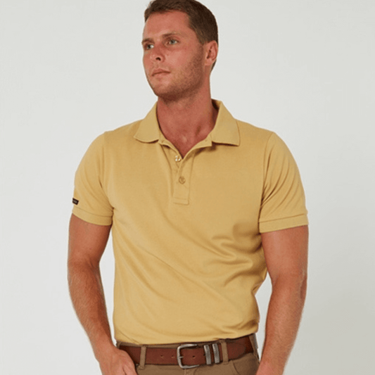 Stewart's Menswear, Mullumbimby. Pilbara Collection classic polo shirt. Photo shows model wearing Pilbara Collection Classic Polo Shirt in Golden Rough Colour.
