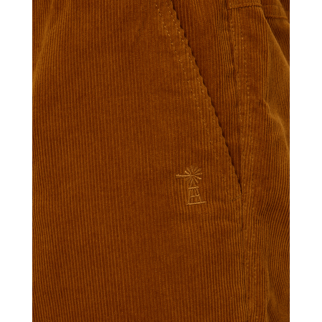 Close view of windmill detail men's Pilbara Collection by Ritemate Workwear Corduroy Shorts in maple with Windmill embroidery detail, available at Stewart's Menswear Mullumbimby.