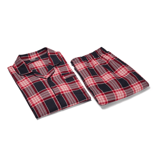 A folded set of red checkered men's long sleeve 100% cotton flannelette pyjamas available at Stewart's Menswear Mullumbimby