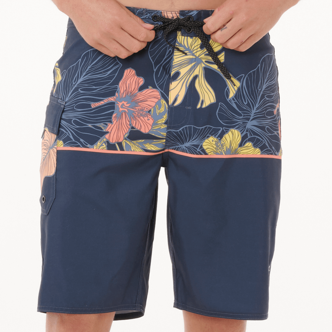 Rip Curl Dawn Patrol 21" Boardshort. Camo recycled Ripsuede surf short, $49.99, available at Stewart’s Menswear Mullumbimby. Front view of Dawn Patrol Boardshort Navy/Orange