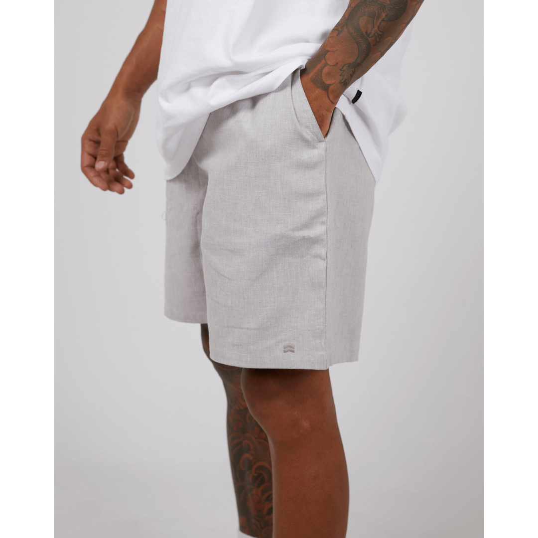 Stewarts Menswear St Goliath Linen blend jogger short. Colour is light grey. Photo shows close up of model wearing Linen blend jogger shorts. Side View