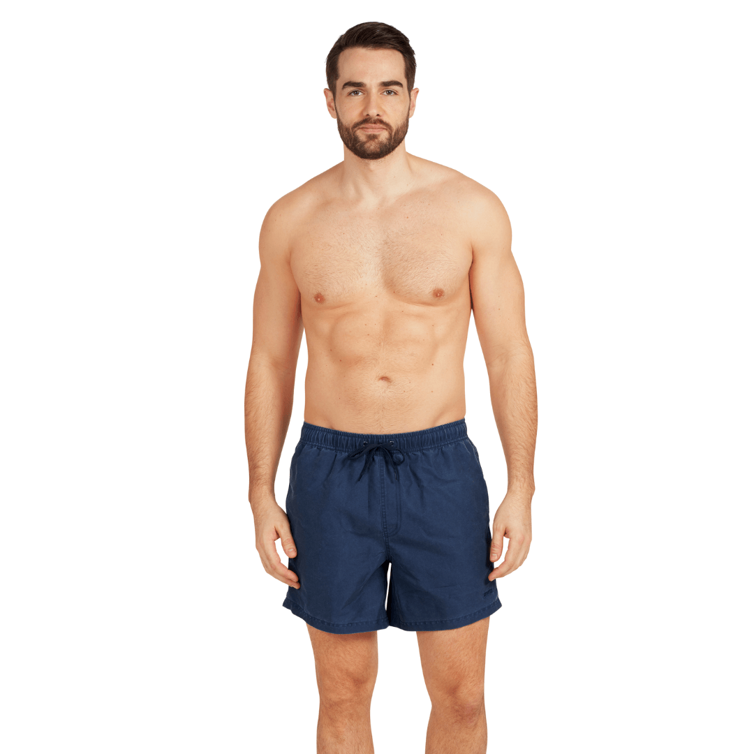 Stewarts Menswear Zoggs swimwear. Model wears Mosman Shorts, colour navy. 