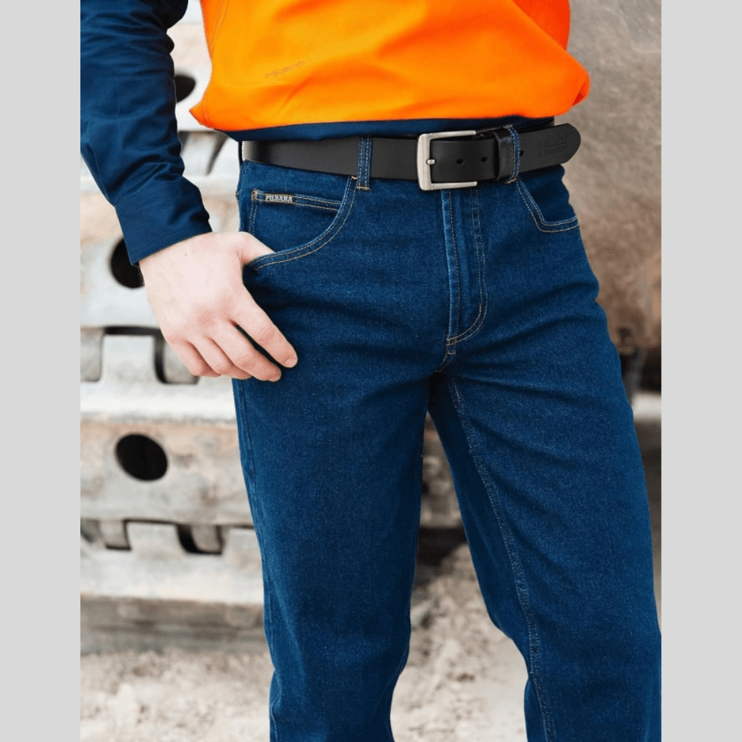 Stewart's Menswear Ritemate stretch denim jeans. Pilbara Men's Stretch Denim Jeans are made from 98% cotton and 2% elastane denim. Designed for comfort and style with the stonewash denim giving them a classic look. These Pilbara Men's Stretch Denim Jeans are perfect for everyday wear, outdoor activities, workwear and casual events. They can be paired with a t-shirt, polo shirt or dress shirt, making them versatile addition to your wardrobe. Lifestyle photo, jeans teamed with Hi Vis polo for work.