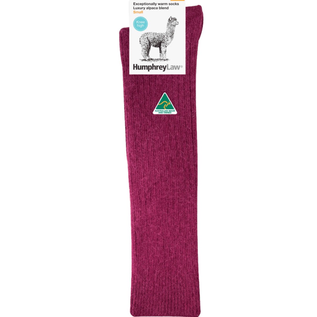 Stewarts Menswear Humphrey Law Australian made alpaca/wool blend knee-hi socks. An exceptionally warm luxury knee-high sock made with a blend of alpaca and wool. Alpaca fibre is soft, supple and smooth and contains microscopic air pockets which act as insulators keeping in the warmth provided by the wool. Please note as alpaca is a luxury fibre these socks are not recommended for high abrasion use such as work boots. Colour is Berry, a rich crimson colour.