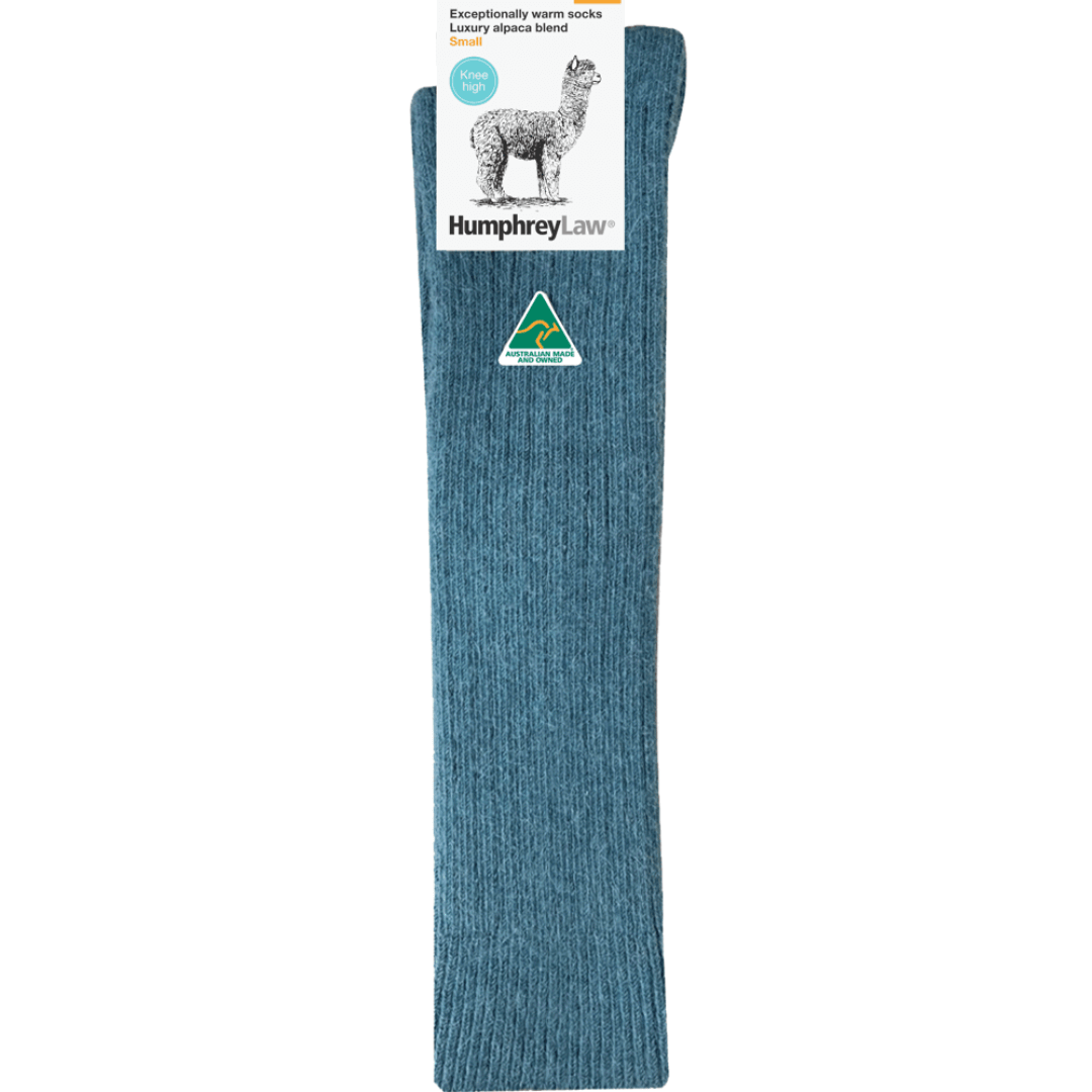 Stewarts Menswear Humphrey Law Australian made alpaca/wool blend knee-hi socks. An exceptionally warm luxury knee-high sock made with a blend of alpaca and wool. Alpaca fibre is soft, supple and smooth and contains microscopic air pockets which act as insulators keeping in the warmth provided by the wool. Please note as alpaca is a luxury fibre these socks are not recommended for high abrasion use such as work boots. Colour is Teal.
