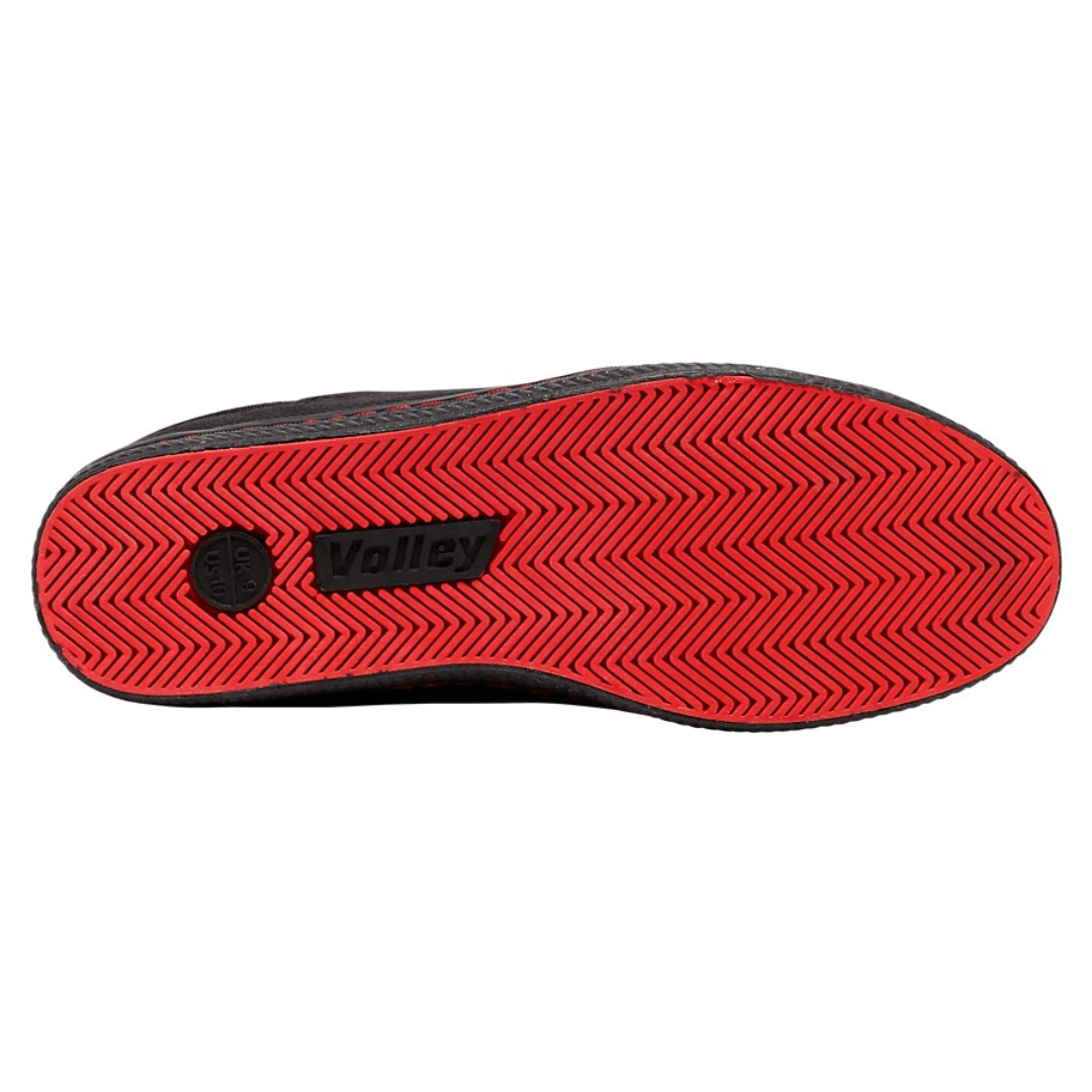 Stewart's Menswear Dunlop Volley Classic shoe. Whether you're dressing up or down, Dunlop Volleys are versatile and will add retro style to your outfit. The simple design features a canvas upper with a moulded rubber toe cap and a contrasting stripe on the side. The shoe's original herringbone rubber outsole is slip resistant and non-marking. Black sole view