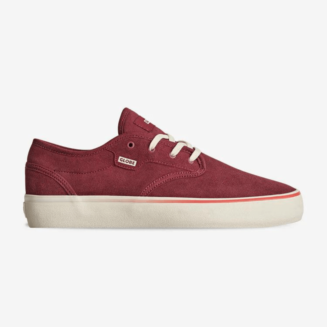Stewart's Menswear Globe Motley II skate shoe in Port/Antique features a refined shape for improved fit and feel while maintaining all the features of the original skate classic. It's suede/canvas upper is colour Port, a rich maroon colour with an antique white (off white colour) sole. Side view