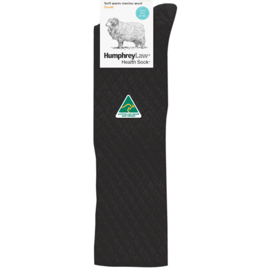 Stewarts Menswear Humphrey Law Australian Made socks. 95% merino wool ladies over the knee health sock. A new addition to the Humphrey Law range is this soft warm merino wool ladies’ sock with a quilted pattern. Made with 95% Fine Merino wool blended with a small amount of nylon to reinforce the heels and toes for longer wear. An extremely comfortable, warm , luxury soft wool sock. Colour is Black.