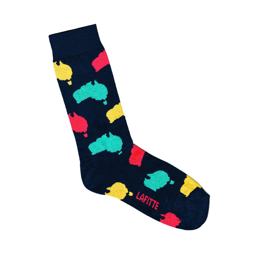 AUstralian Made novelty socks. Design is maps of Australia (crimson, aqua & yelllow) on navy background.