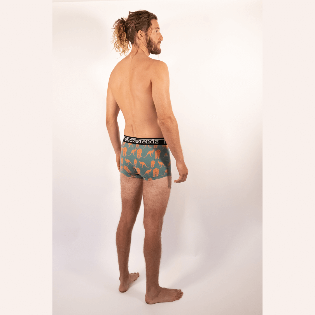 Stewarts Menswear Reer Endz Men's underwear. Made from Organic cotton. Image shows model wearing K.Roo print trunks. Green trunks with kangaroo print.