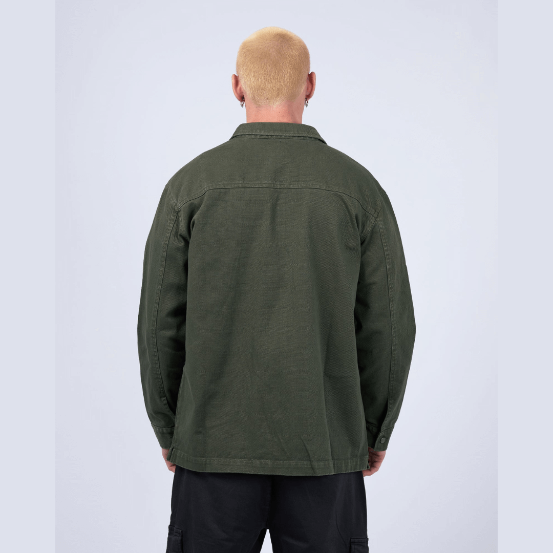 Stewarts Menswear Mullumbimby. Photo shows male model wearing St Goliath Disorder Overshirt. Back view, Colour is Khaki.