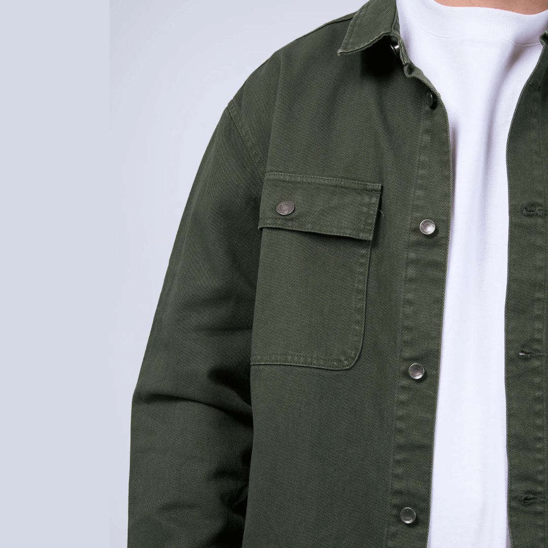 Stewarts Menswear Mullumbimby. Photo shows male model wearing St Goliath Disorder Overshirt. Close up view, Colour is Khaki.