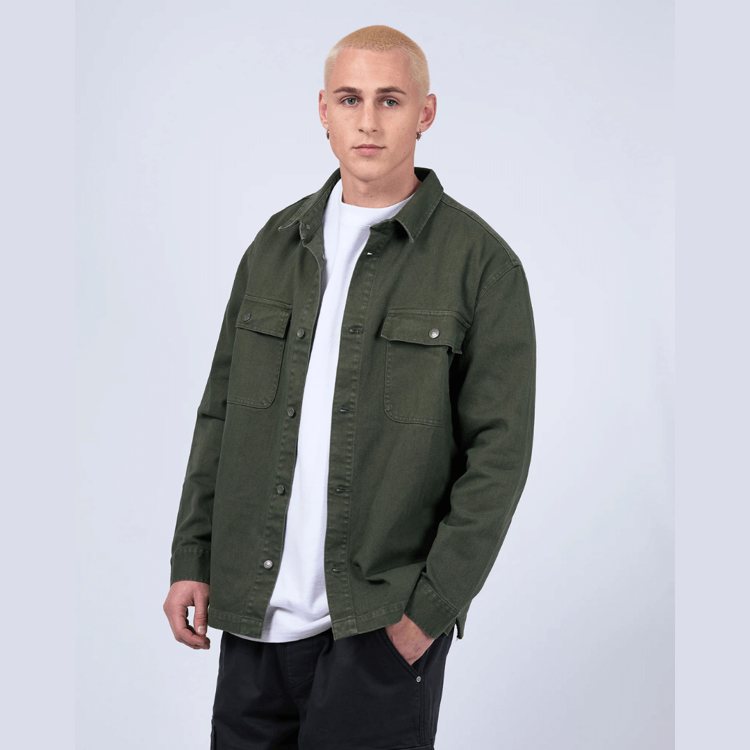Stewarts Menswear Mullumbimby. Photo shows male model wearing St Goliath Disorder Overshirt. Front view, Colour is Khaki.