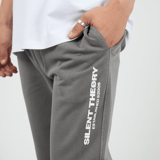 Close up view of Silent Theory Essential Theory Trackpant  brushed fleece in charcoal available at Stewart’s Menswear Mullumbimby.