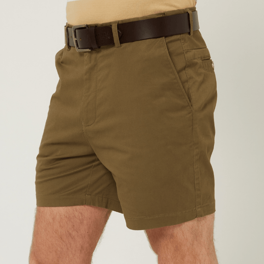 Model wearing men's Pilbara chino shorts by Ritemate in Capers (khaki), classic fit with action waistband, Stewart's Menswear