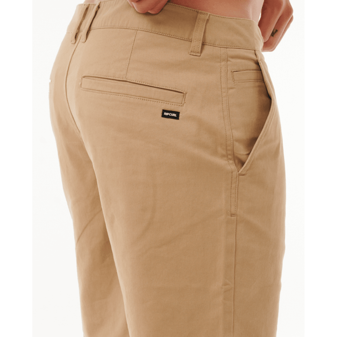 Classic Surf Chino Walkshort  available at Stewart’s Menswear Mullumbimby. Men’s stretch cotton chino shorts with garment wash finish and back welt pockets. Photo shows close up view, colour is Khaki