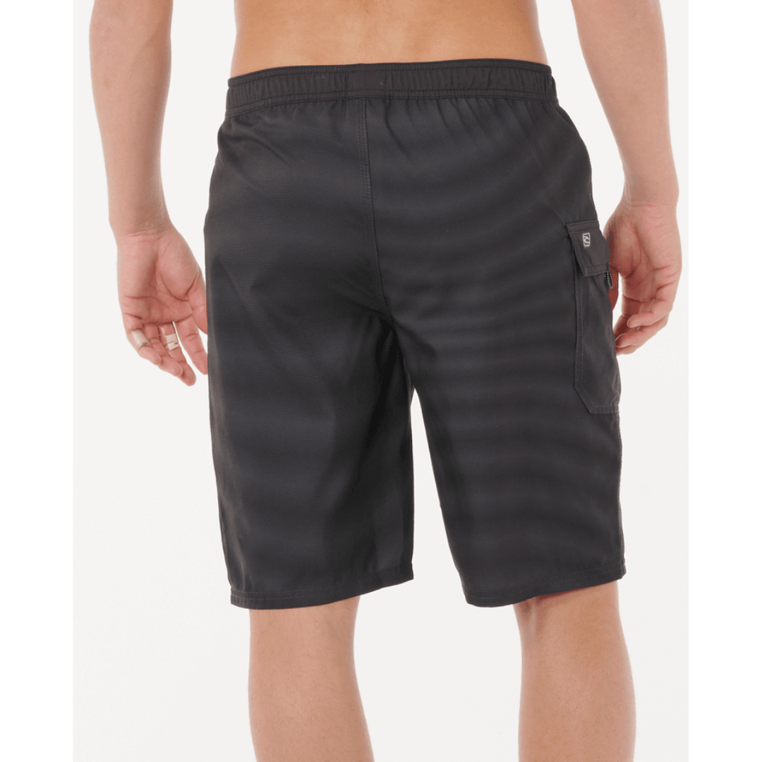 Shock Easy Fit 21" Boardshort  available at Stewart’s Menswear Mullumbimby. Men’s recycled polyester boardshort with elastic waistband and engineered print. Photo shows back view, colour is black.